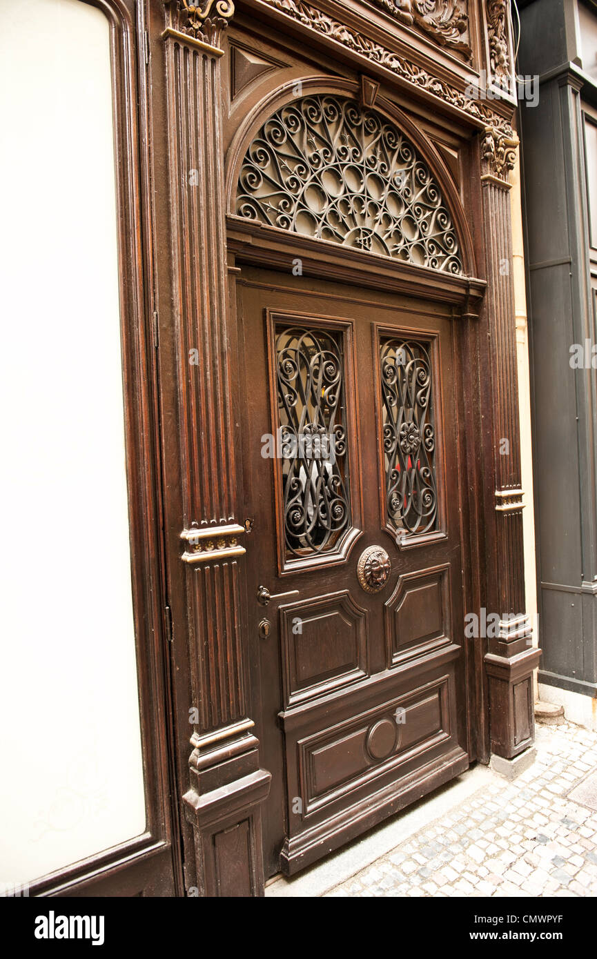 A nice picture of the side door to a classical European architecture. Stock Photo