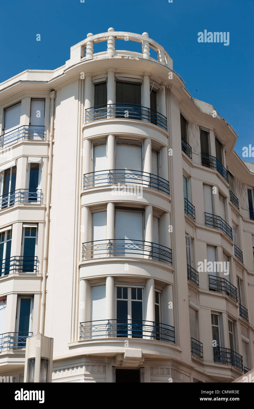 Circular balconies on the corner of a European building. Stock Photo
