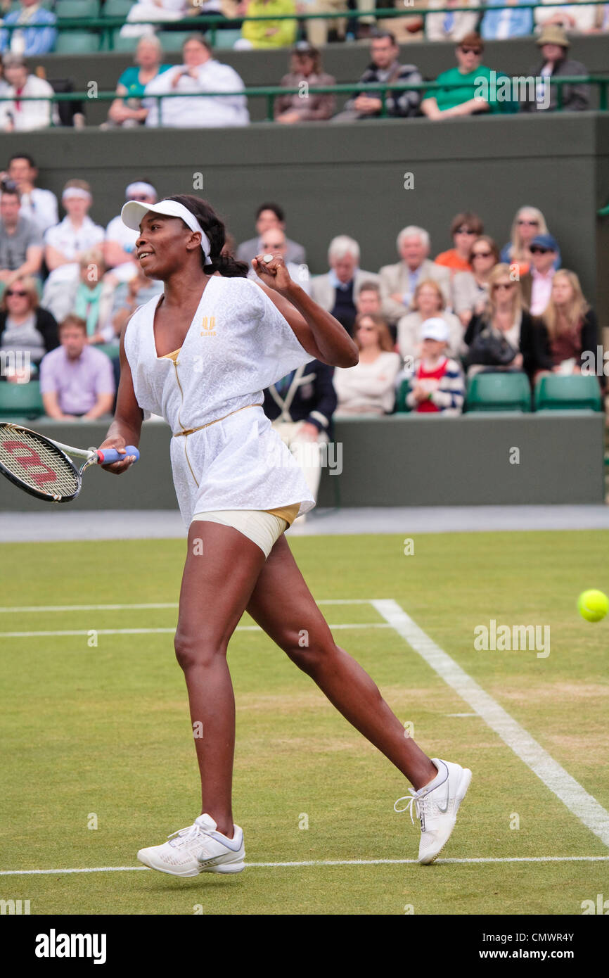 Venus Williams (USA) celebrates match point in the 2nd Round of the Wimbledon Tennis Championships 2011 Stock Photo