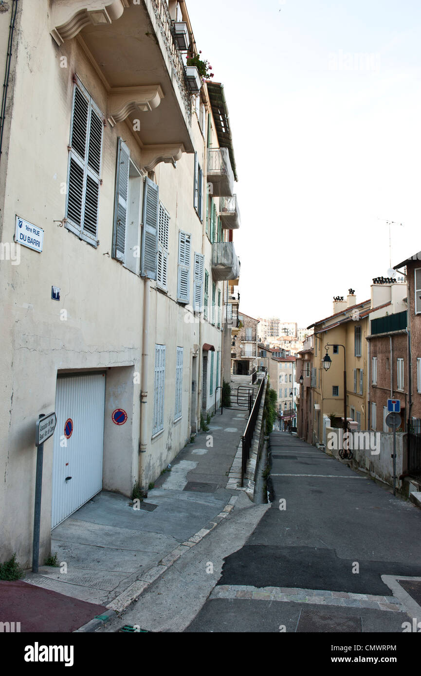 An extremely long shot down the alley of a European neighborhood. Stock Photo