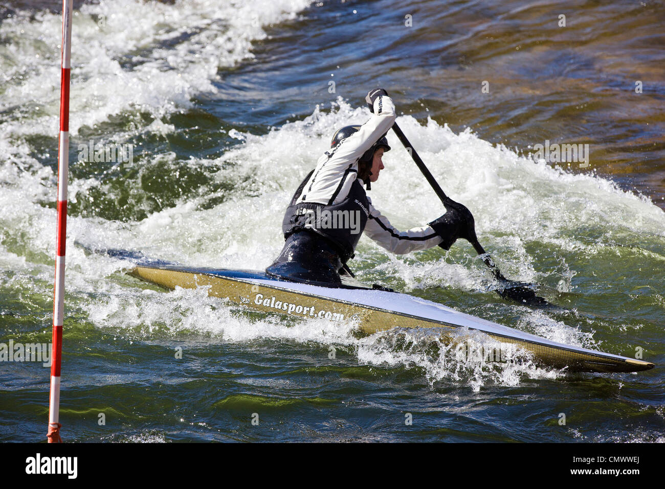 Female whitewater kayak slalom racer, Arkansas River, Salida, Colorado, USA Stock Photo