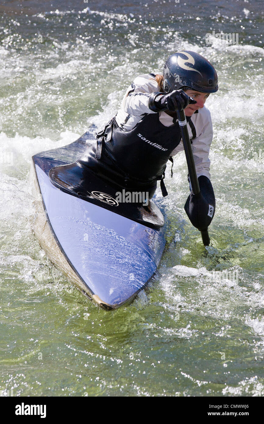 Female whitewater kayak slalom racer, Arkansas River, Salida, Colorado, USA Stock Photo
