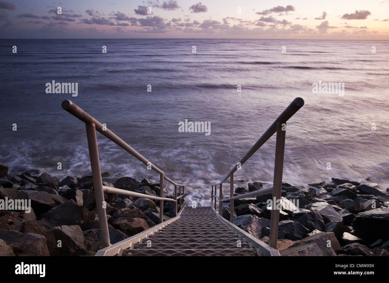 Steps leading down to the water at Machans Beach, Cairns, Queensland, Australia Stock Photo