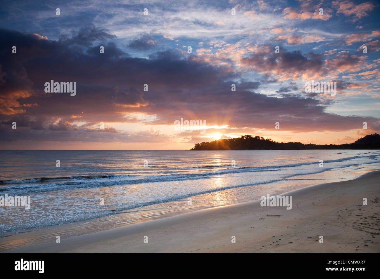 View along beach at dawn. Kewarra Beach, Cairns, Queensland, Australia Stock Photo