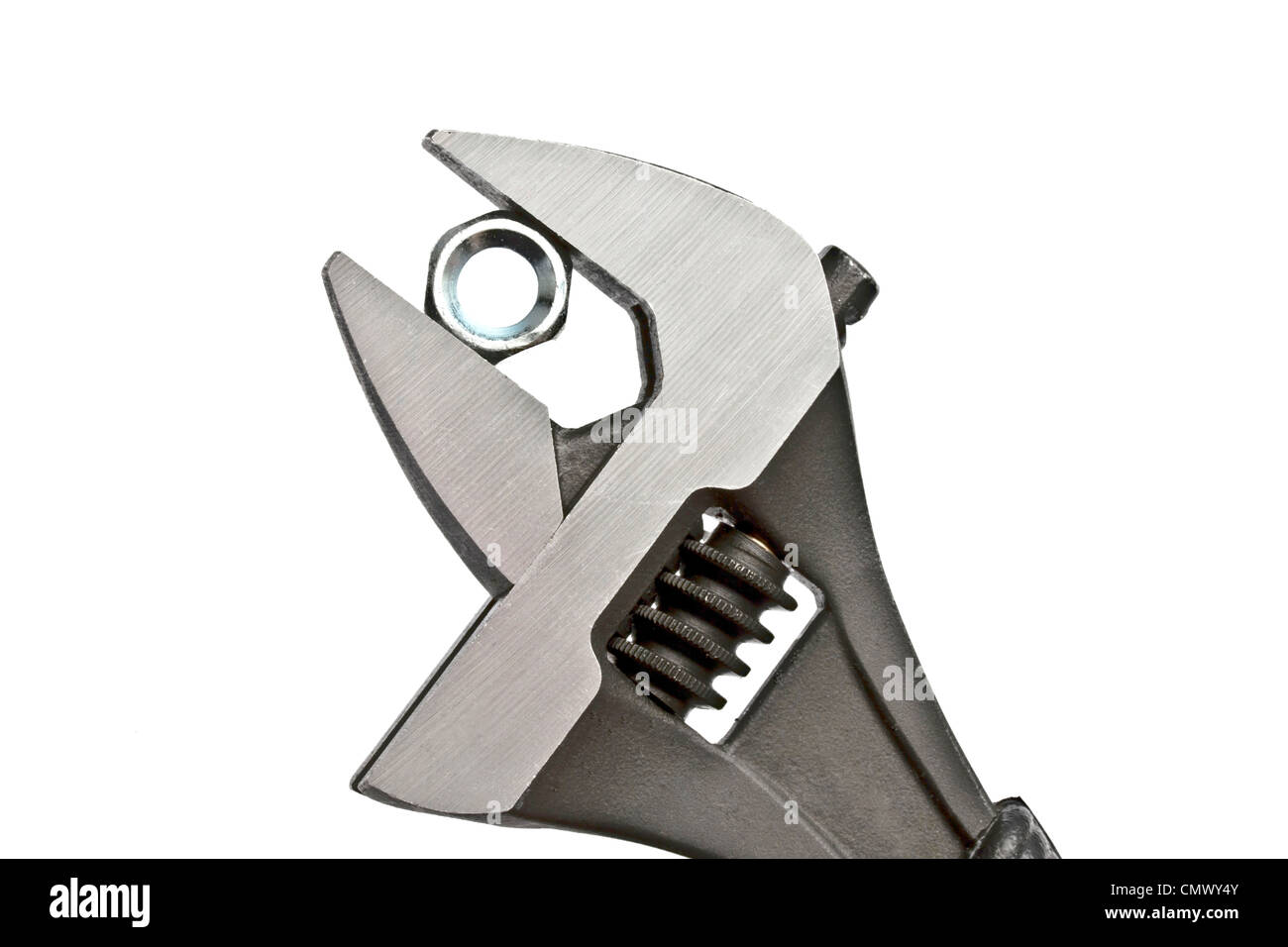 Adjustable wrench and nut isolated on white background Stock Photo - Alamy