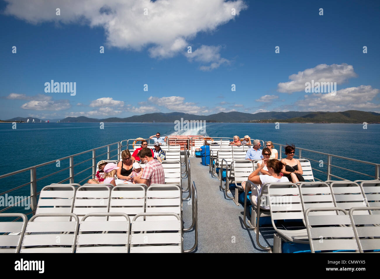 Passenger ferry cruising between the Whitsunday Islands. Airlie Beach, Whitsundays, Queensland, Australia Stock Photo