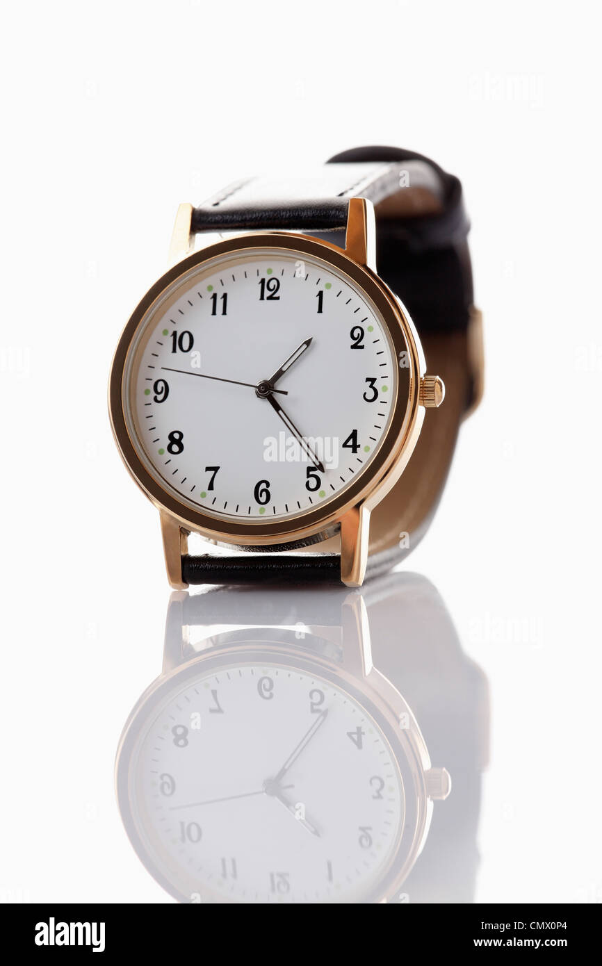 Wrist watch on white background, close up Stock Photo - Alamy