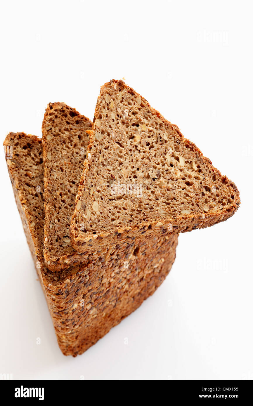 Multigrain rye bread slices on white background Stock Photo Alamy