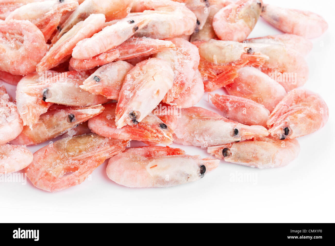 Pile of shrimps, closeup on white background Stock Photo