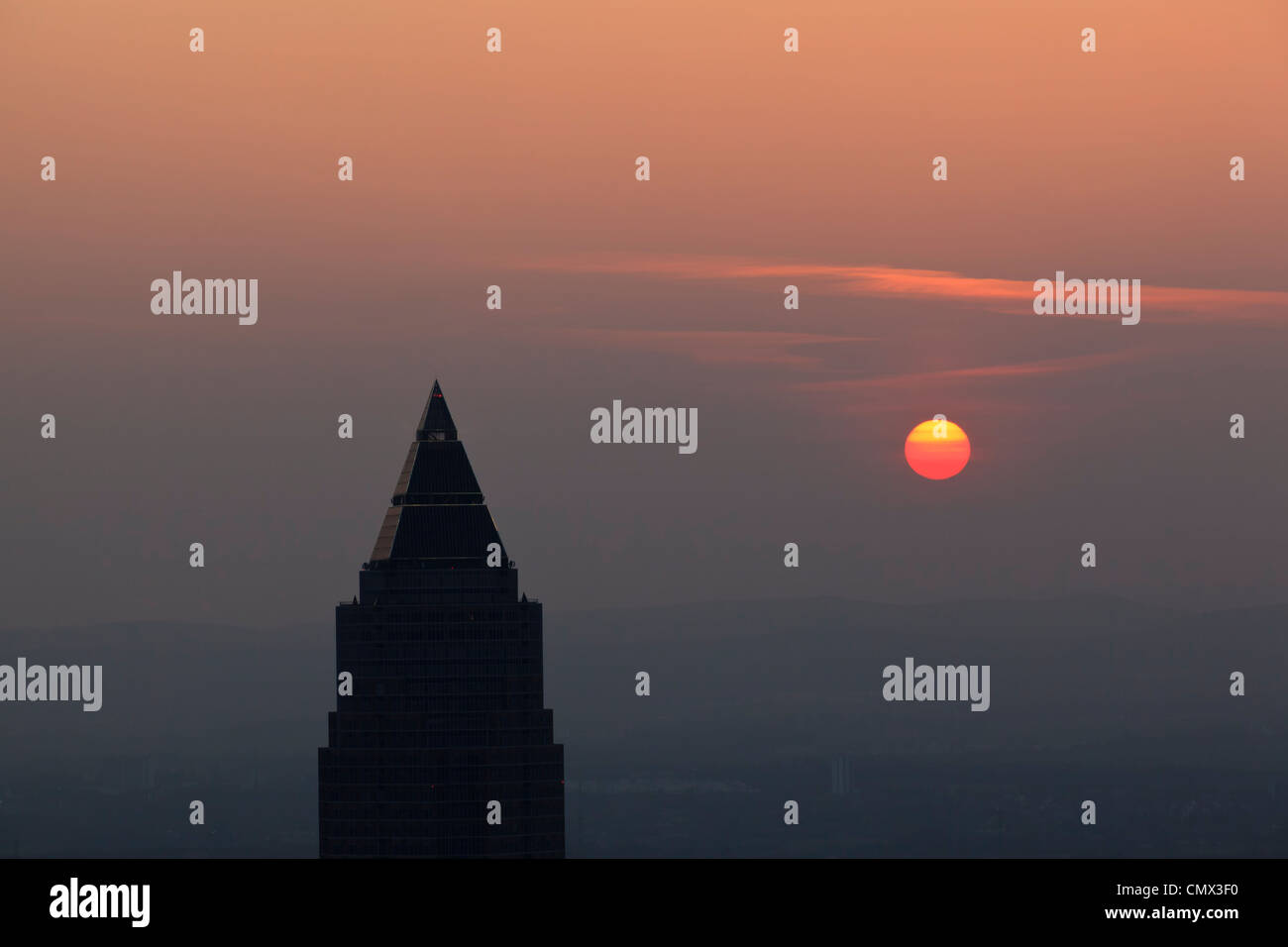 Germany, Frankfurt, View of Messeturm at sunset Stock Photo