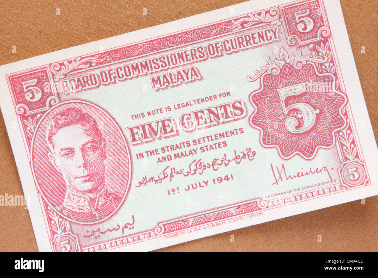 Malaya banknote dated 1941 for The Straits Settlements and Malay States with image of King George VI - 5 cents Stock Photo