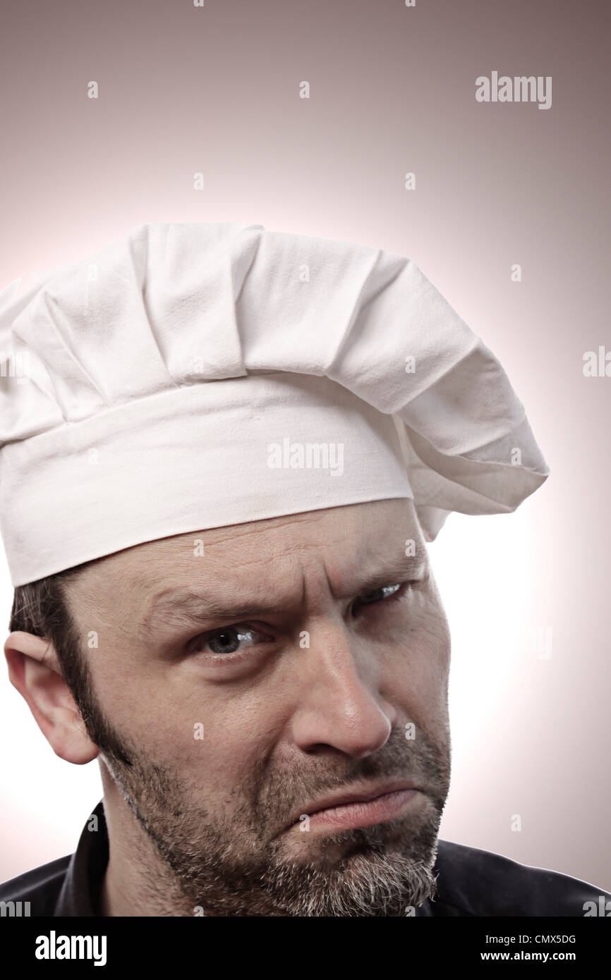 Portrait of an angry chef Stock Photo Alamy