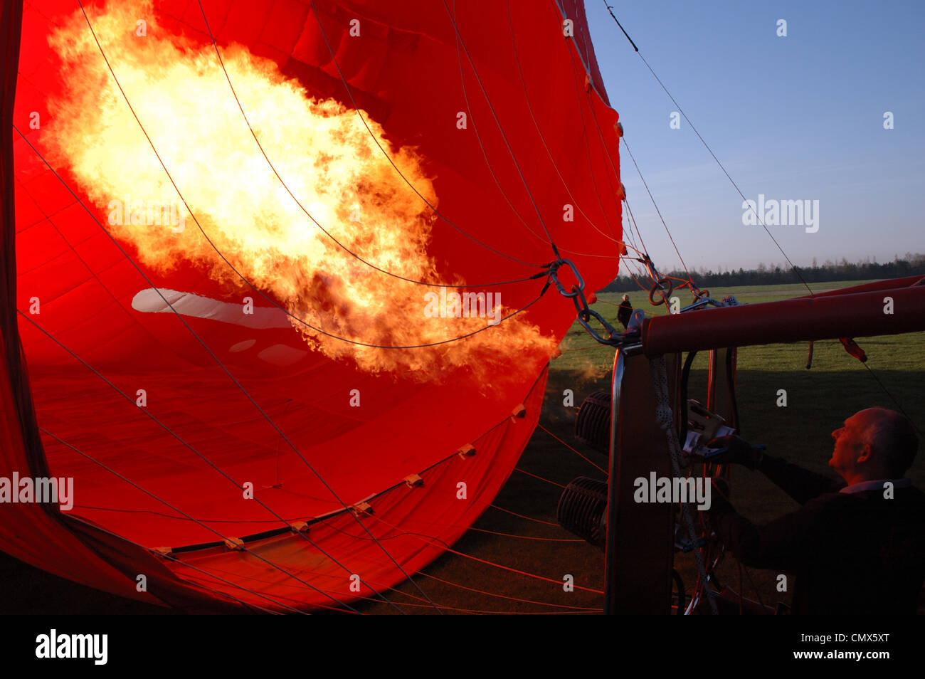 Turning on the burners to inflate a Virgin hot air balloon, Norfolk, UK