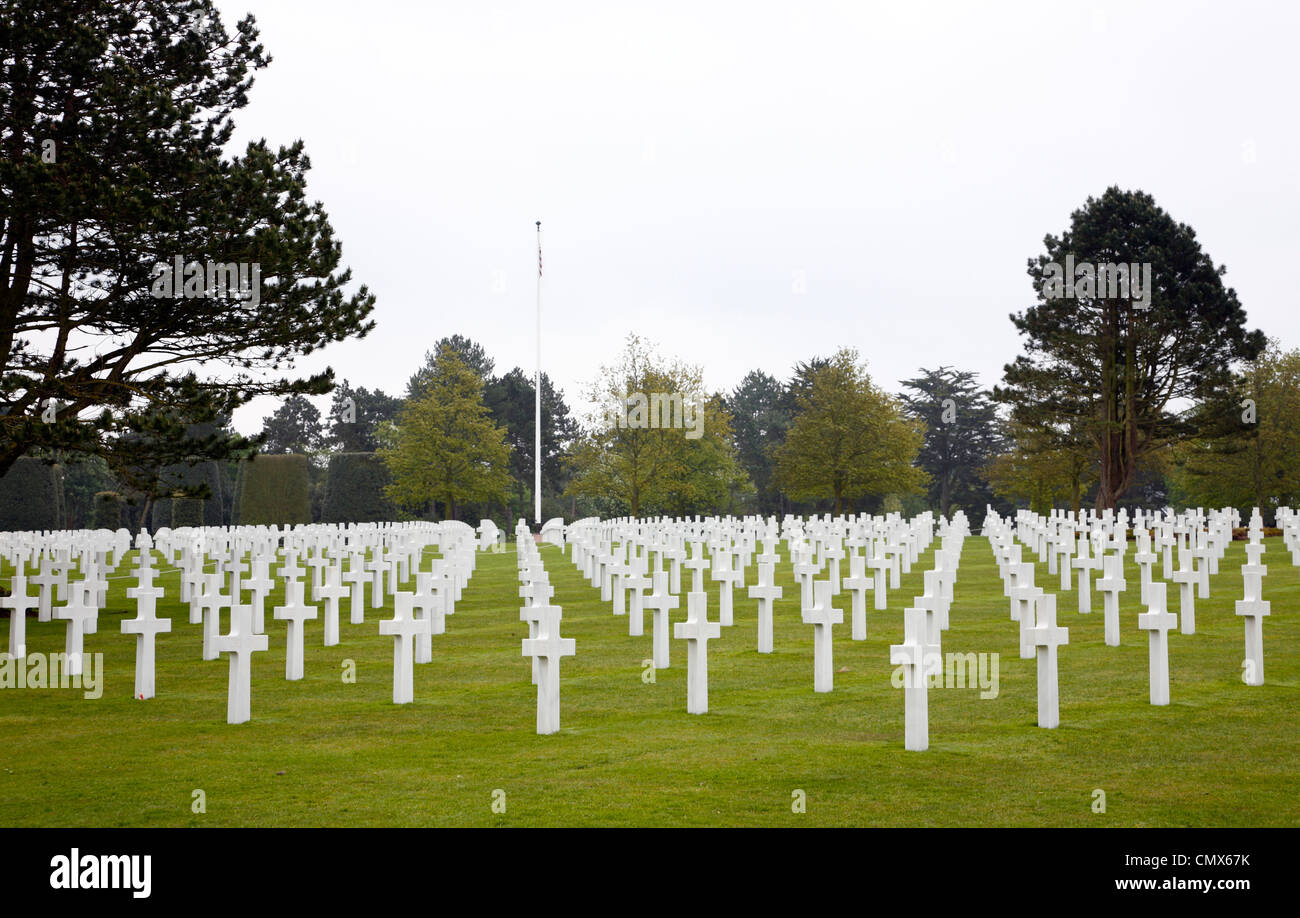 White crosses and graves at The Normandy American Cemetery and Memorial at Omaha Beach, Normandy, France, near Bayeux. Stock Photo
