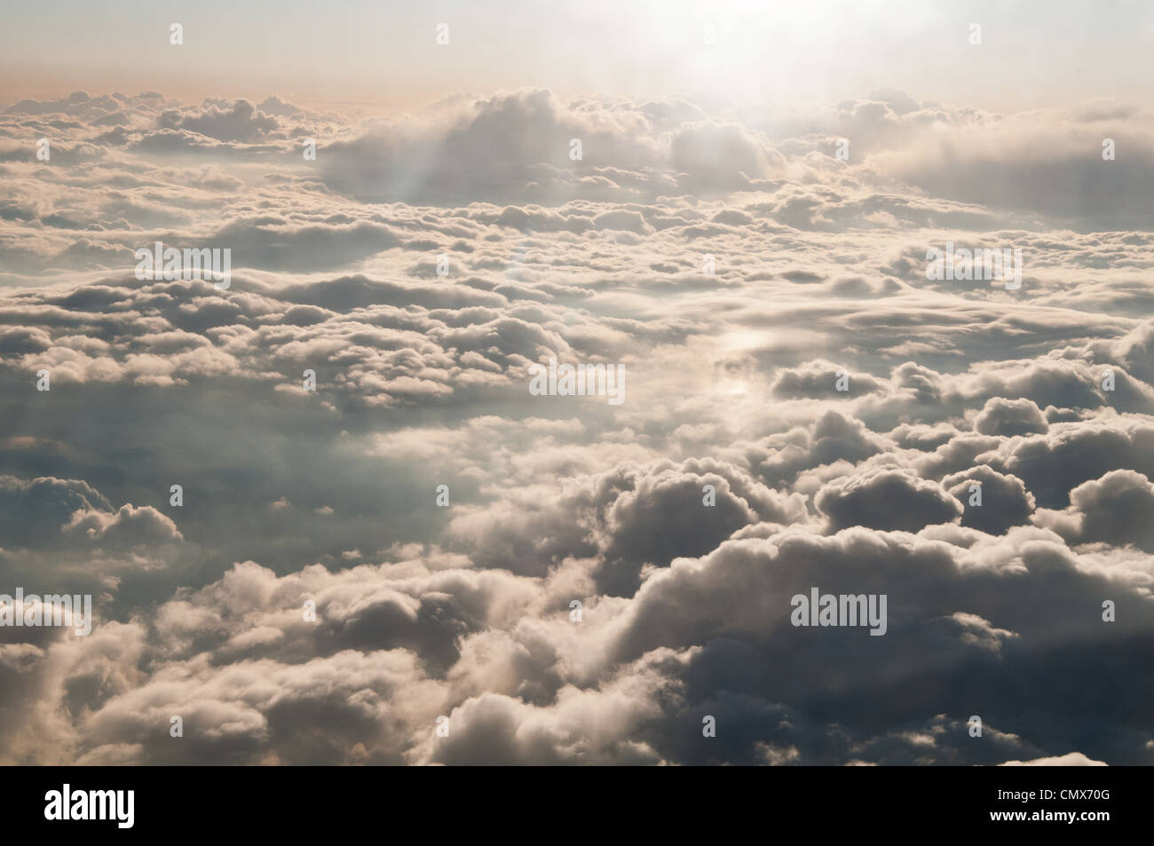 Picture from aircraft cabin above clouds. Stock Photo