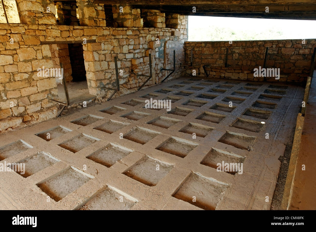 View of the now empty squares of the Eastern Church floor where the fifty mosaics were found, before being moved to the museum. Stock Photo