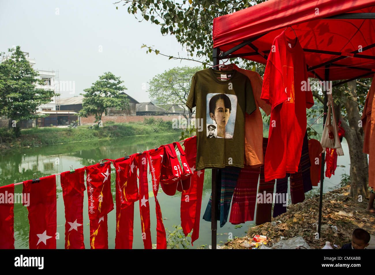 Vendor selling t-shirts and souvenirs raising money for the National League for Democracy (NLD) in Mandalay Stock Photo