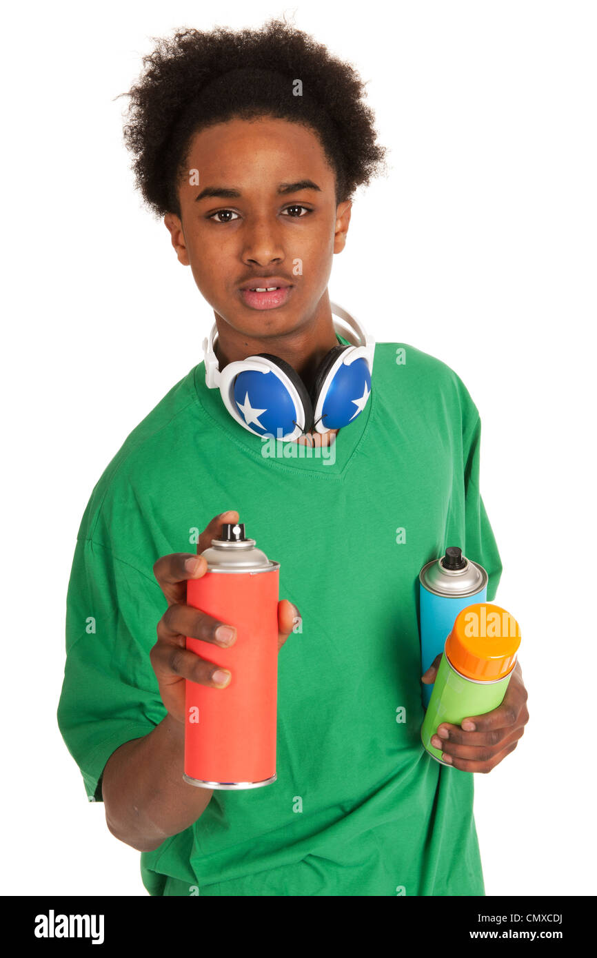 Portrait of a black teenager with graffiti aerosols Stock Photo