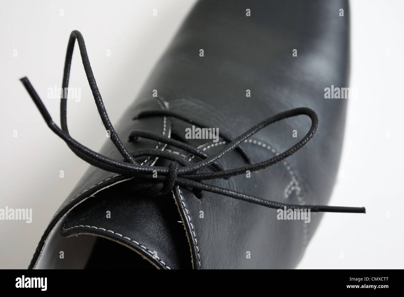 Black leather shoe hi-res stock photography and images - Alamy