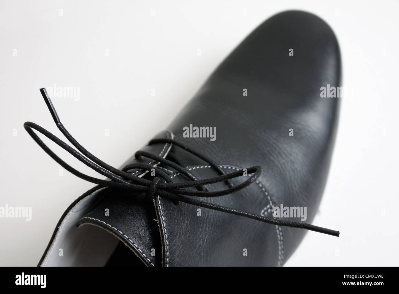 Black leather shoe hi-res stock photography and images - Alamy