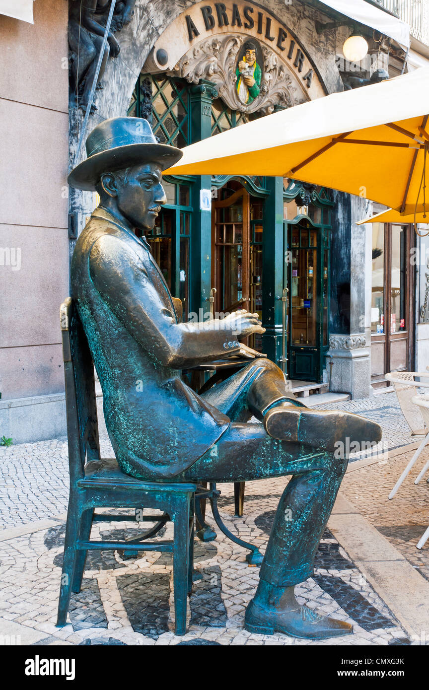 A bronze statue of Portuguese poet Fernando Pessoa sits outside the Café A  Brasileira, Lisbon, Portugal Stock Photo - Alamy