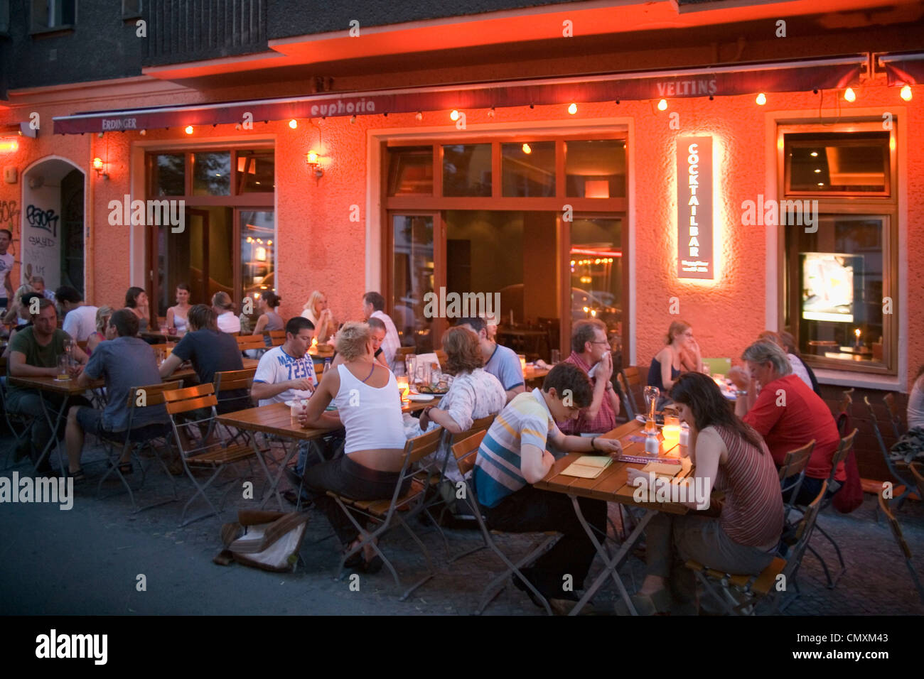 Berlin Friedrichshain, Simon Dach street, street cafes restaurants bars, young  people Stock Photo