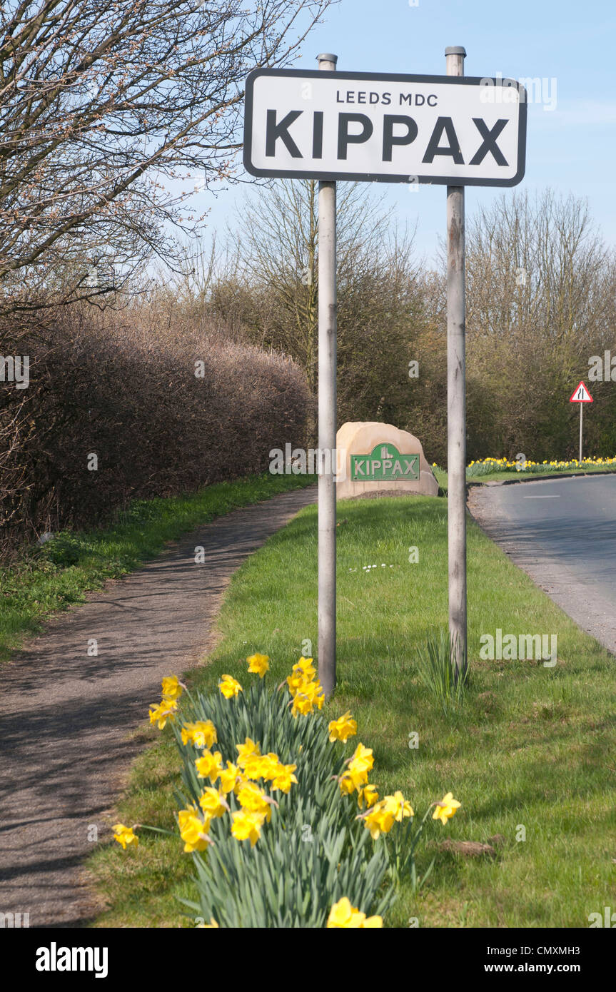 Kippax metal and stone road signs in spring Stock Photo