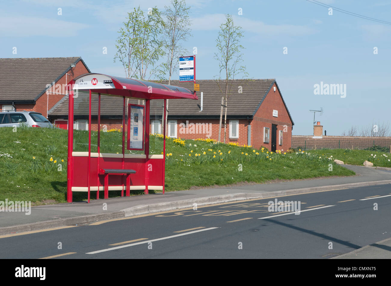 Bus stop and community centre, springtime, Gibson Lane, Kippax Stock Photo