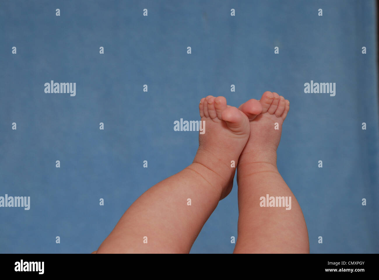 Baby boy feet Stock Photo Alamy