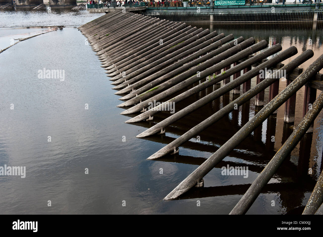 A long shot of wooden docks on the river outside the Czech Republic. Stock Photo