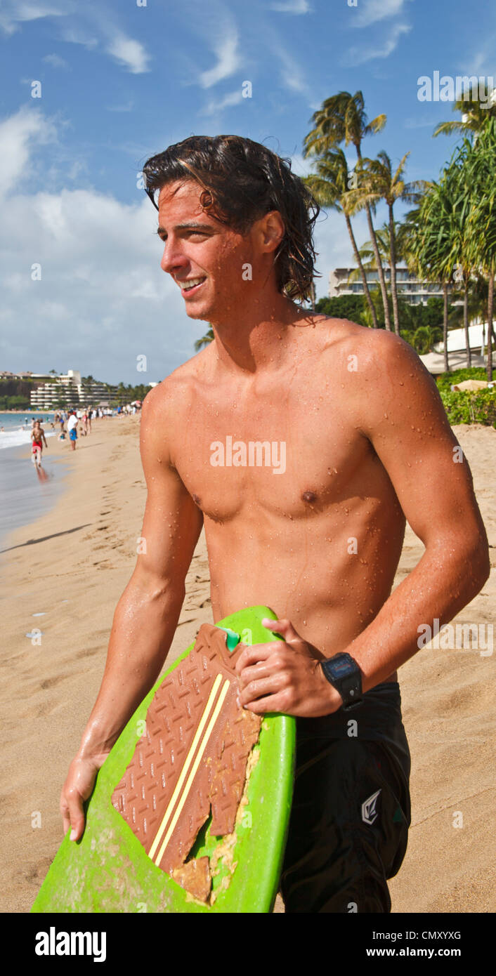 Man with skimboard at Kaanapali Beach on Maui Stock Photo Alamy