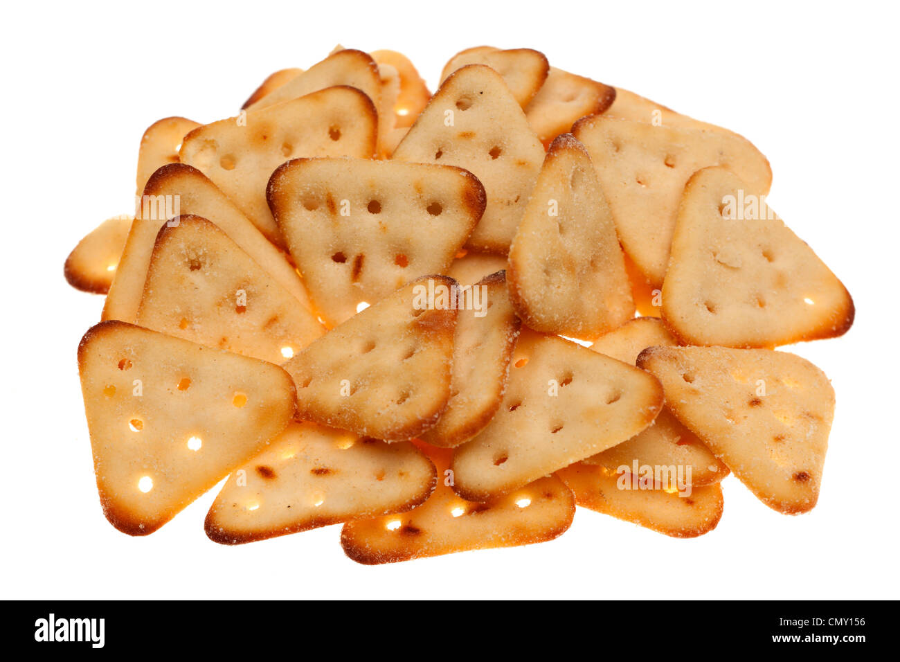 Pile of triangular cheese and onion flavoured biscuits Stock Photo
