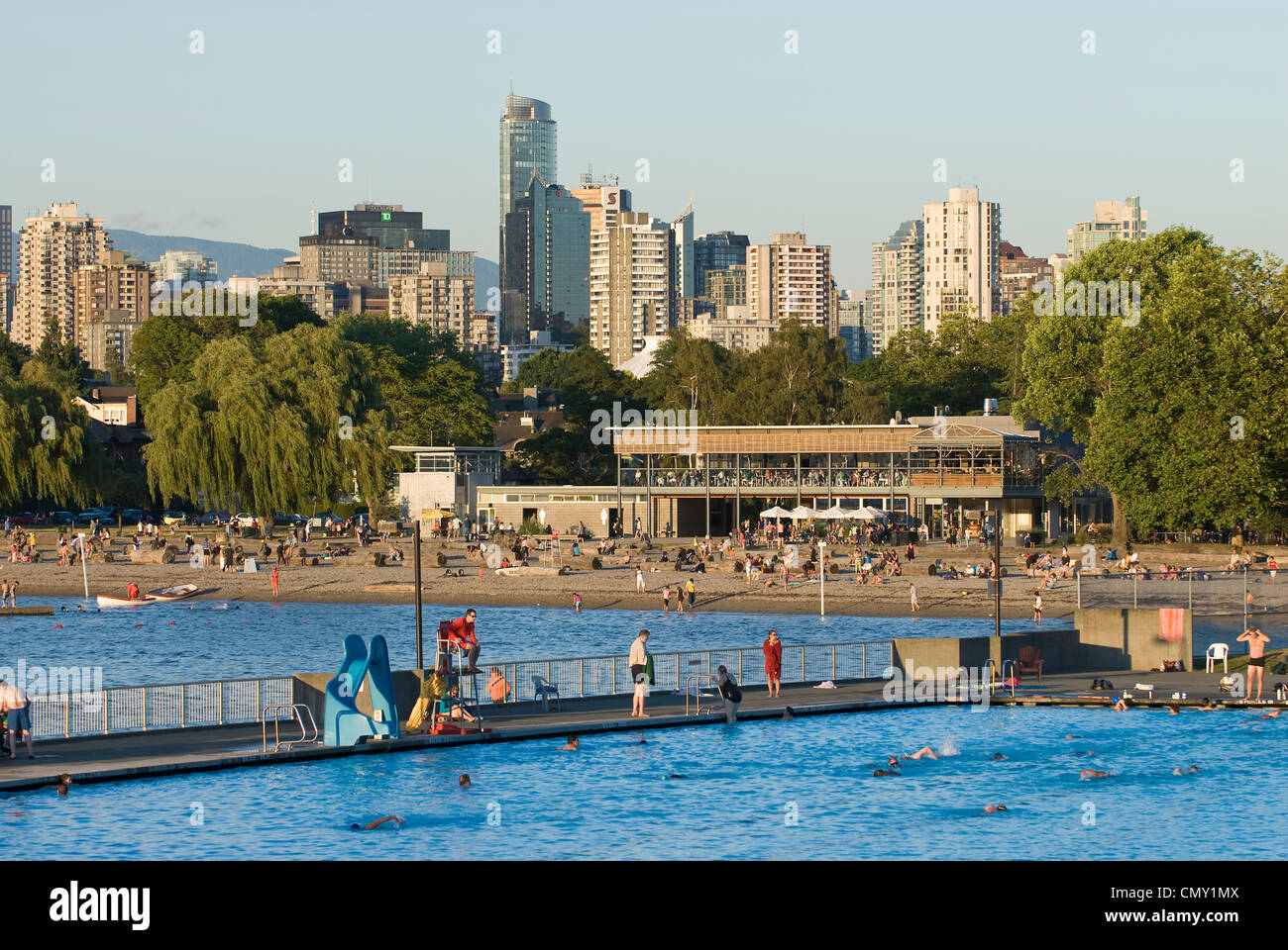 Late day view of people swimming in Kitsilano pool, Vancouver, British Columbia Stock Photo