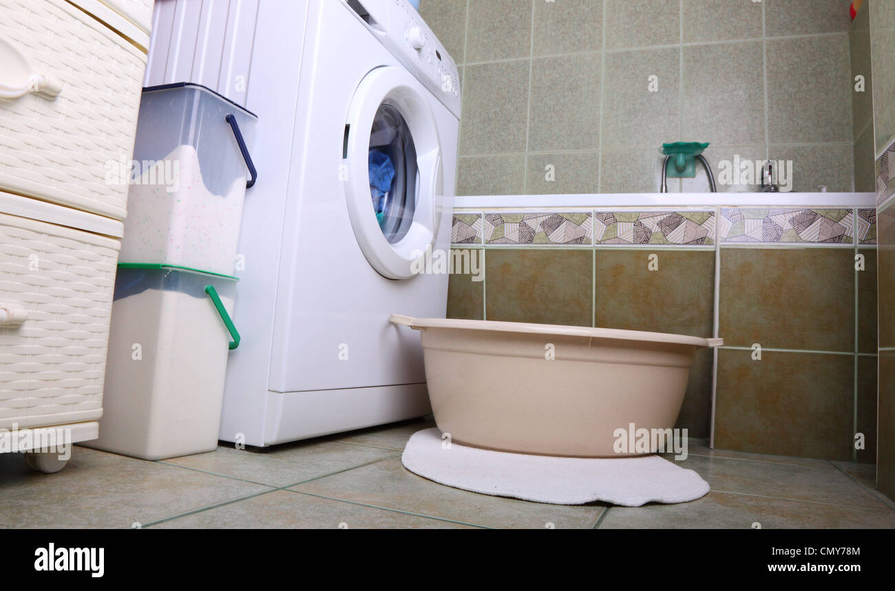 towels in washing machine cloths indoor bathroom Stock Photo Alamy