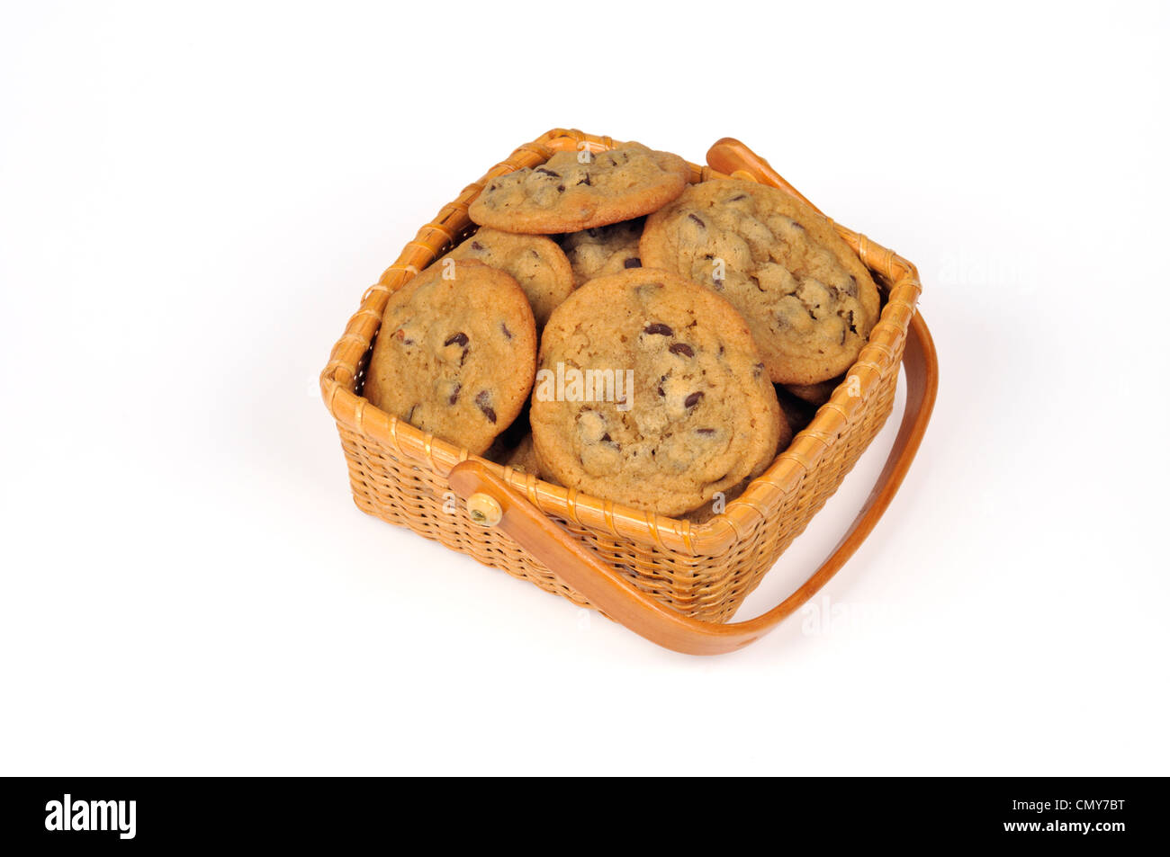 A basket full of homemade chocolate chip cookies on white background cut out Stock Photo