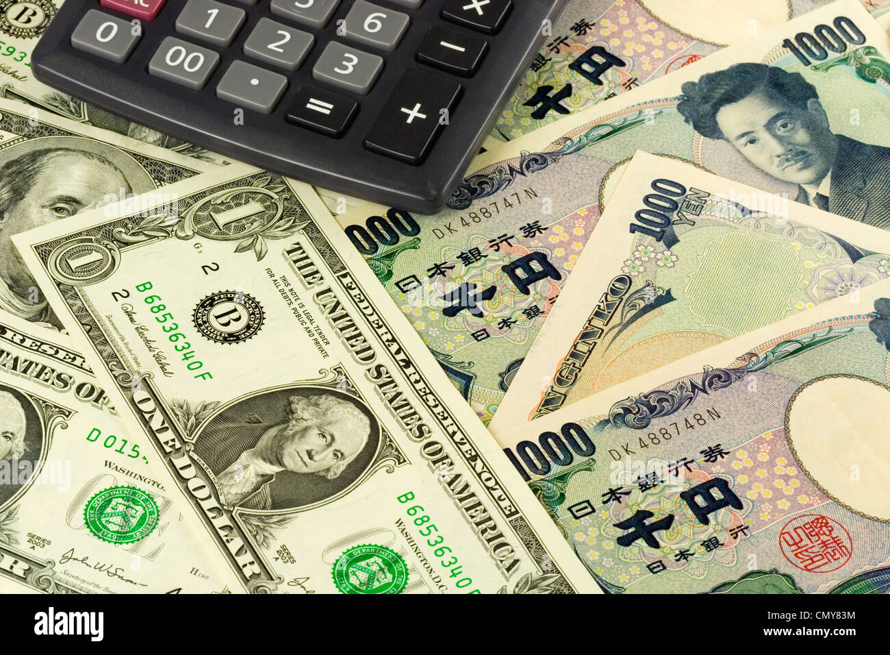 US and Japanese currency pair commonly used in forex trading with calculator Stock Photo