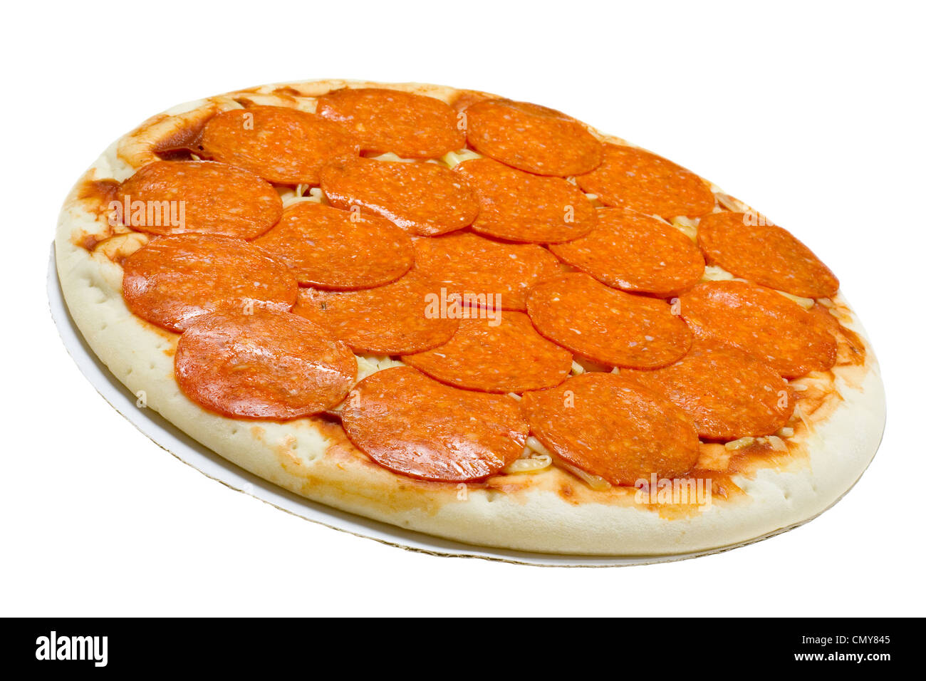 Uncooked pepperoni and cheese pizza isolated on white background Stock