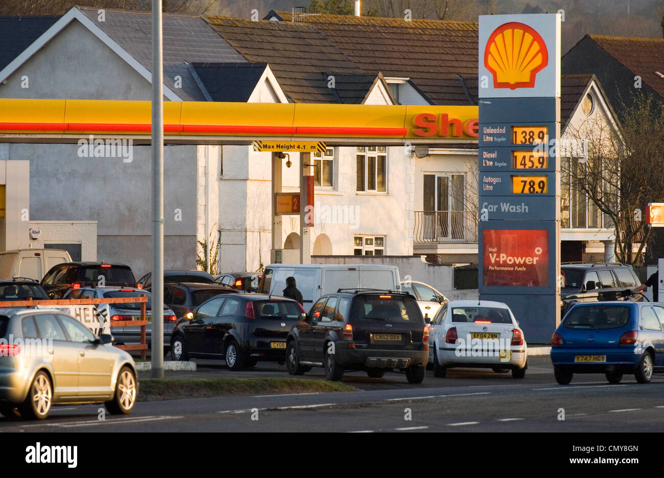 Motorists queue up for fuel at the Shell Halfway filling station on the