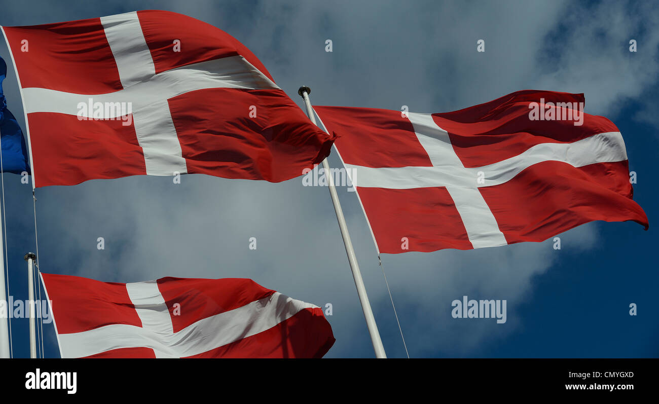 Red Danish flags are pictured in Copenhagen, Denmark, March 30, 2012. Stock Photo