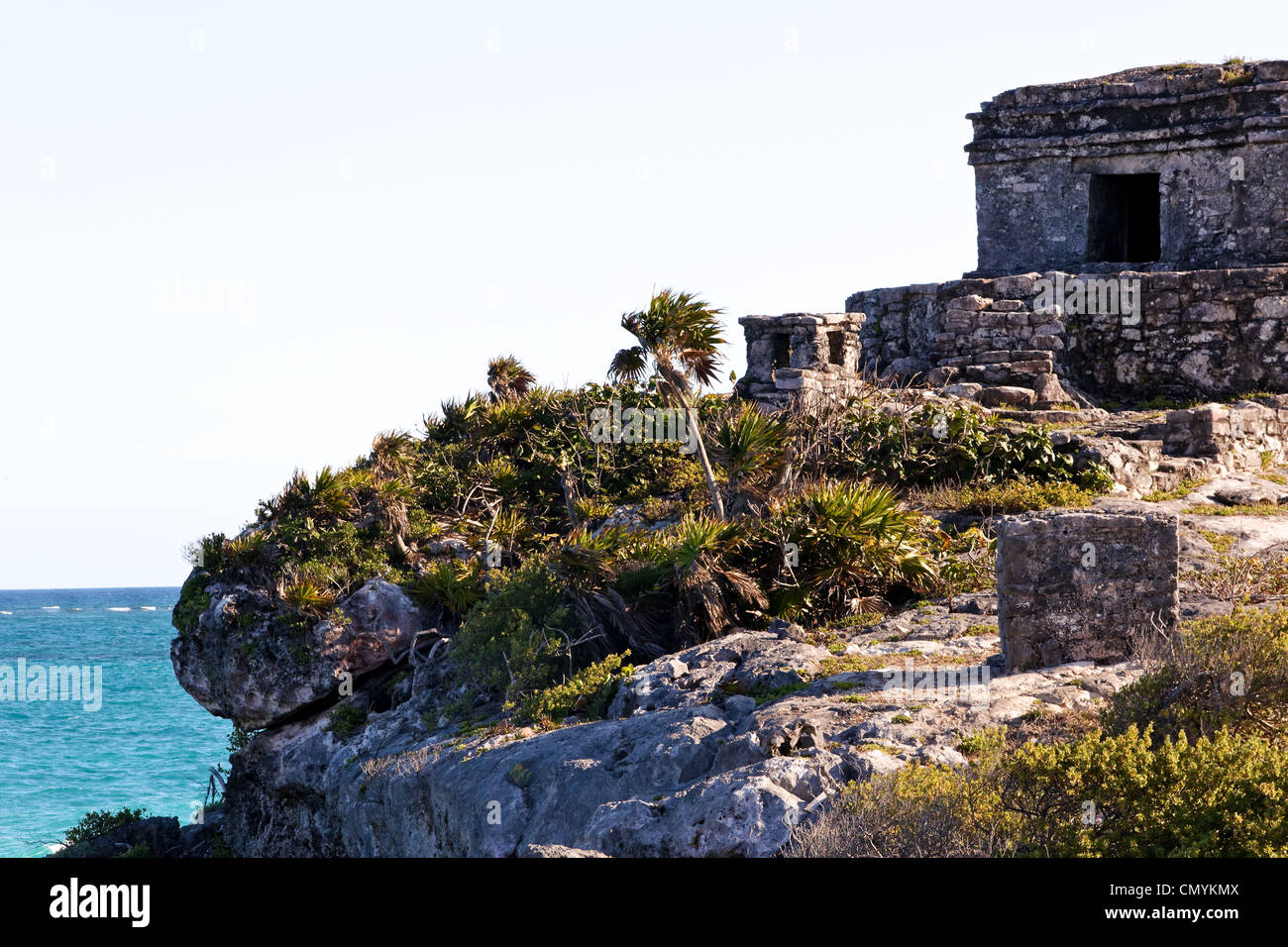 Cliff and Ruins at the Mayan archaeological zone in Tulum, Quintana Roo, Mexico. Stock Photo