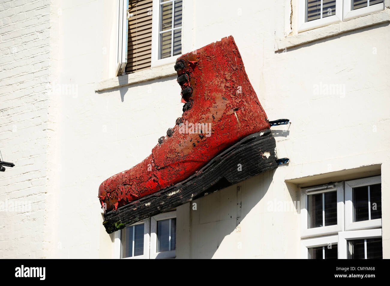 United Kingdom, London, Camden, giant shoe above a shop in Camden Stock Photo