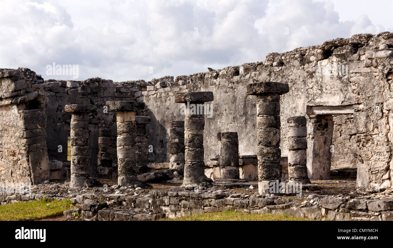 Columns line a Mayan ruin at the archaeological zone of Tulum, Quintana Roo, Mexico. Stock Photo