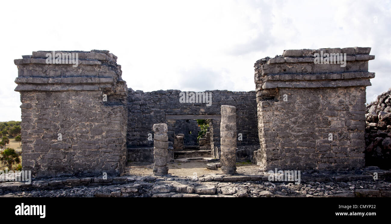 View into a crumbling Mayan building at the archaeological zone of Tulum, Quintana Roo, Maxico. Stock Photo