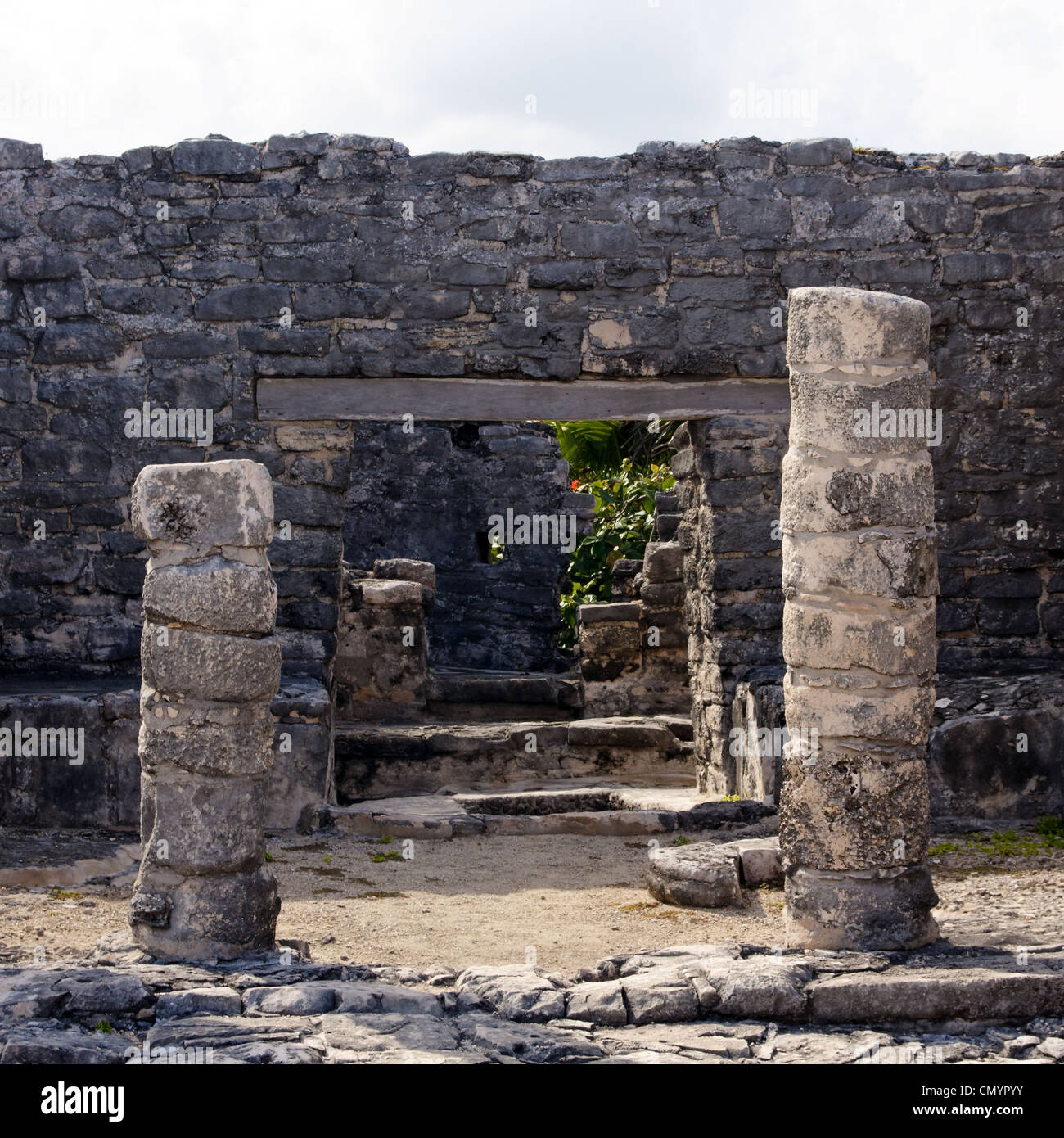 Portal into Mayan ruins at the archaeological zone in Tulum, Quintana Roo, Mexico. Stock Photo
