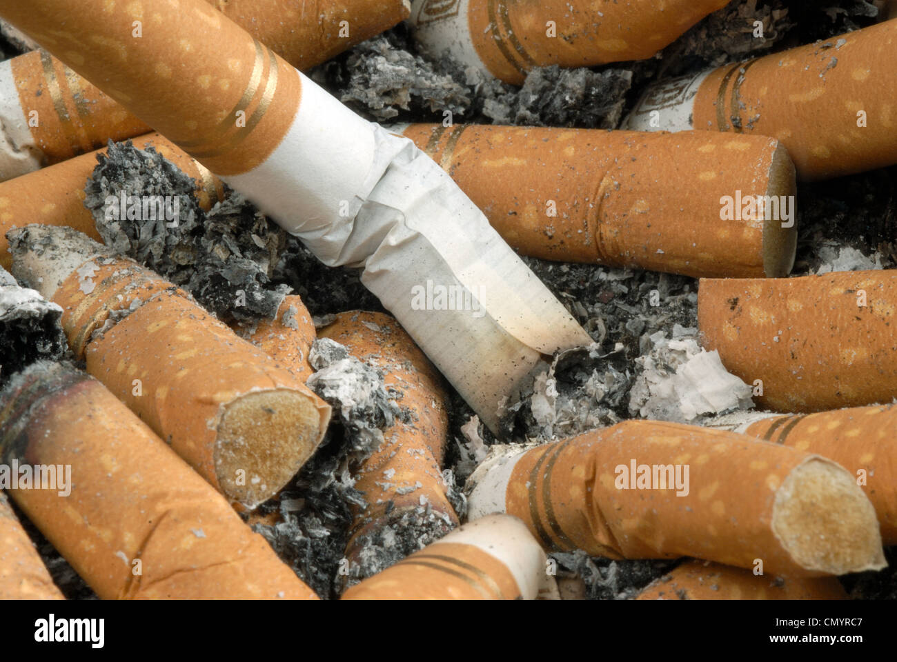 cigarette stompie Cigarette butts in ashtray hi-res stock photography and images