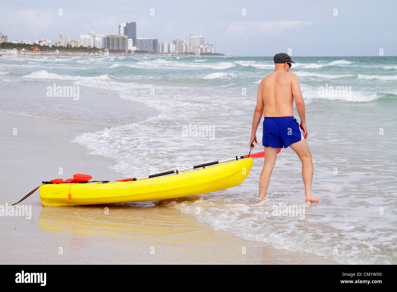 Miami Beach Florida,Atlantic Ocean water shore,surf,waves,water,man men