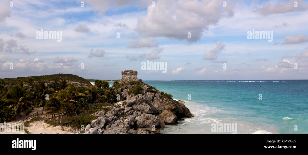 Panoramic view of cliffs with Mayan ruins above the ocean at Tulum, Quintana Roo, Mexico. Stock Photo