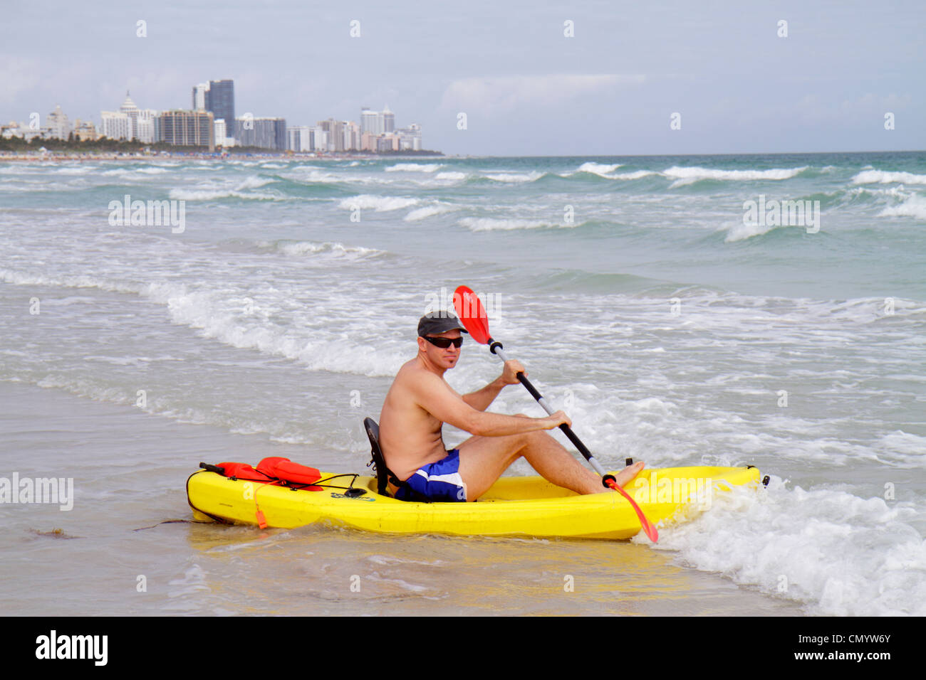 Miami Beach Florida,Atlantic Ocean water shore,surf,waves,water,man men