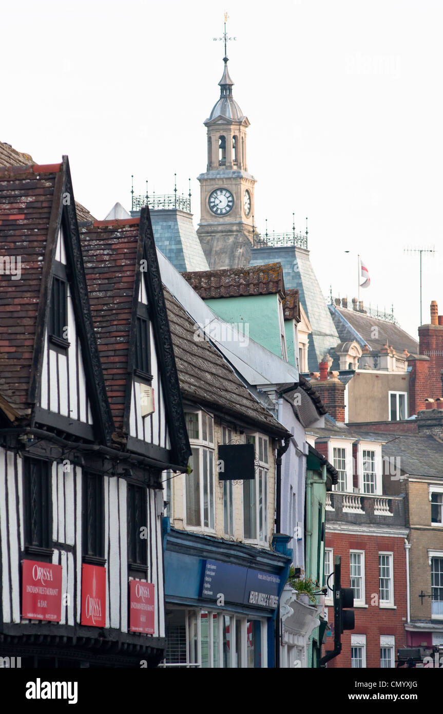 Ipswich town hall seen over shop fronts. Suffolk. England Stock Photo