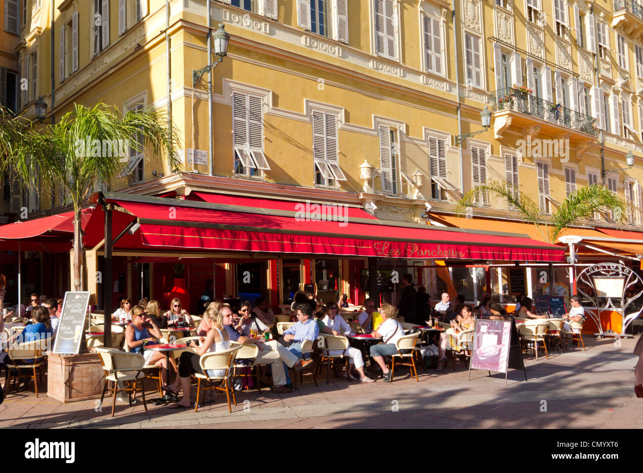 Street Cafe, Les Ponchettes, Flower Market, Cours de Saleya, Cote d Azur, Nice, Provence, France Stock Photo